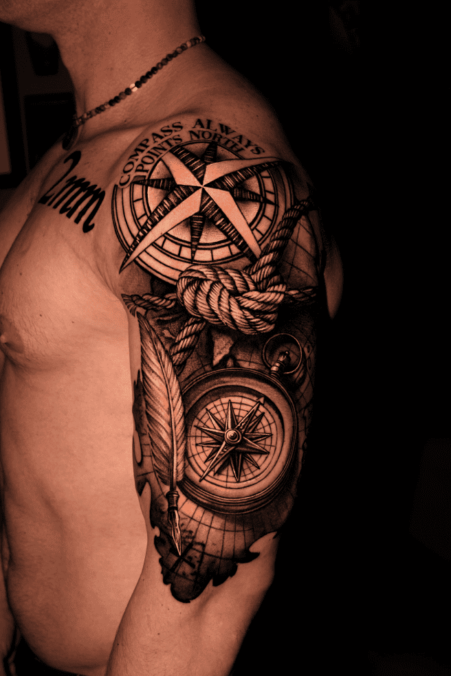 Compass, rope and map shoulder piece with "Compass always points north" lettering, black and grey realism
